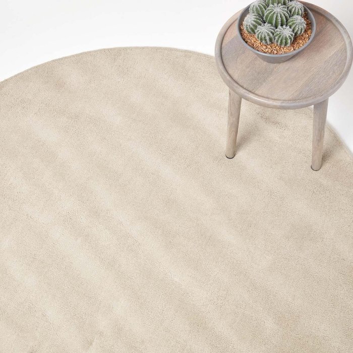 The Range | Homescapes Hand Tufted Plain Cotton Round Rug - Cream / 70cm Homescapes Hand Tufted Plain Cotton Round Rug - Cream / 70cm