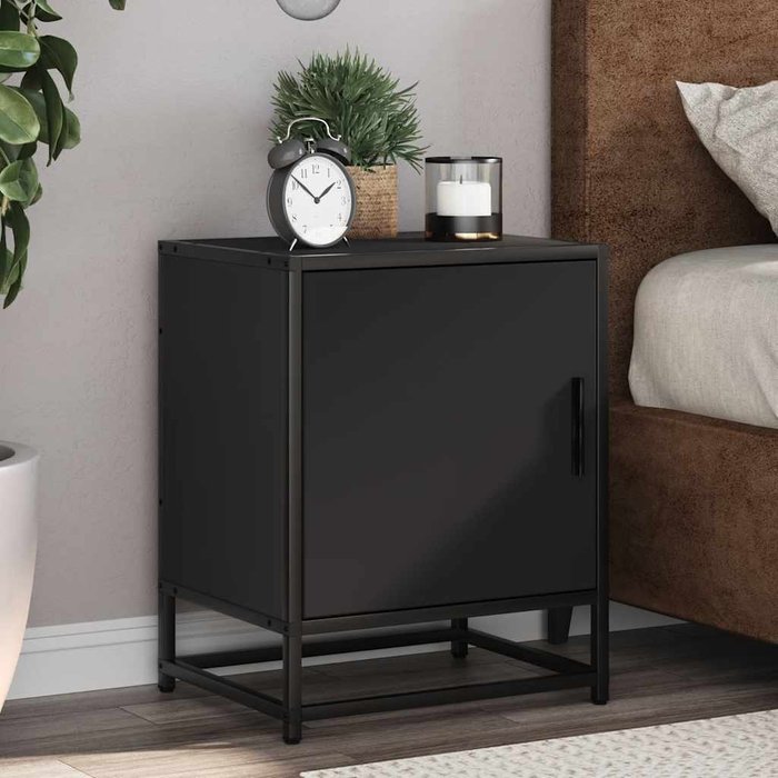 Mesita de noche negra de 40x31x50 cm, fabricada en madera de ingeniería y metal.