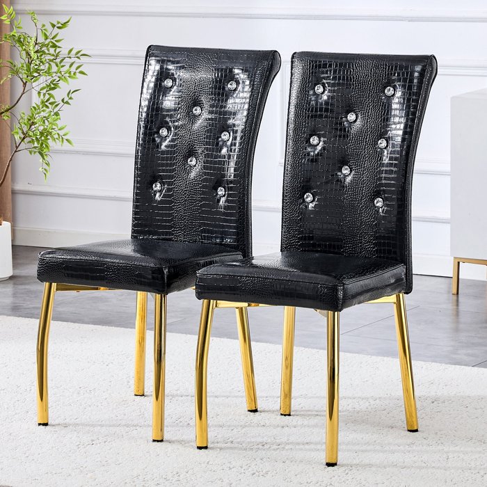 Juego de 2 sillas de comedor, asiento acolchado, patas de metal dorado y negro.