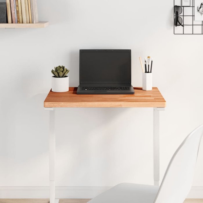 Tablero rectangular de madera maciza de haya de 60x40x2,5 cm.