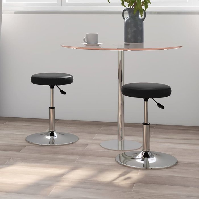 Juego de 2 sillas de comedor de piel sintética color negro.