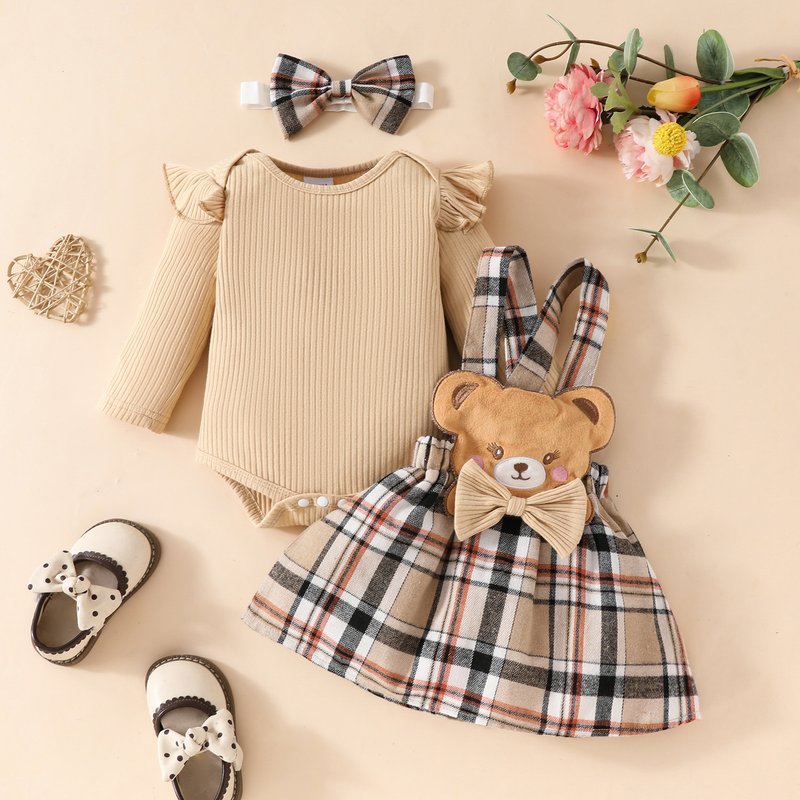 European And American Baby Autumn And Winter Striped Long Sleeved Triangle Romper + Bowknot Plaid Bear Doll Suspender Skirt + Hairband Set