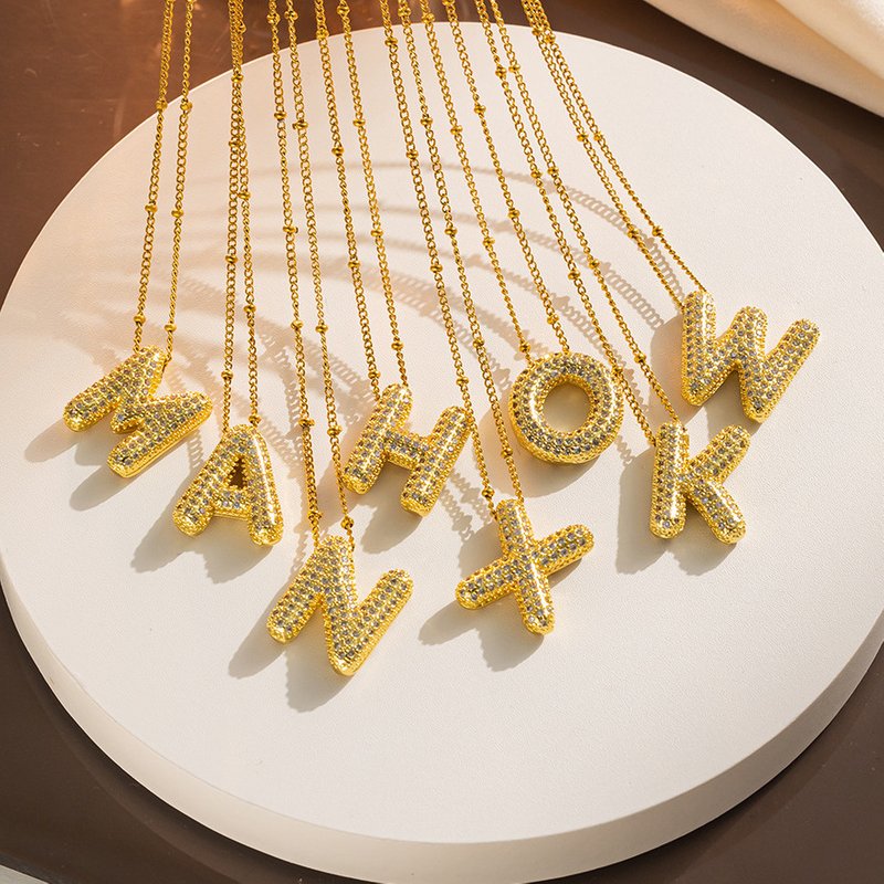 Hot selling trendy hip-hop micro inlaid zircon 26 letter pendant necklace with copper gold plating, fashionable and versatile classic accessory
