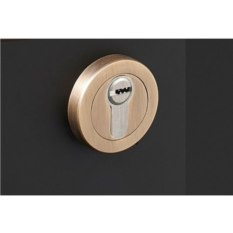 Rosaces clé I pour cylindre - design DCG - vieux laiton mat DCG