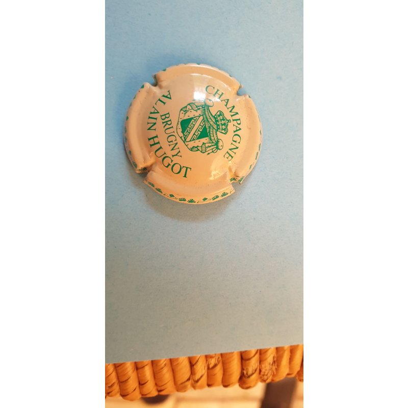 Superbe Capsule De Champagne Alain Hugo Inscription Verte Sur Fond Creme !