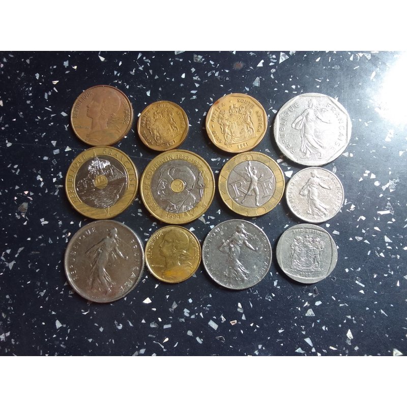 Divers Pièces De Monnaie En Franc