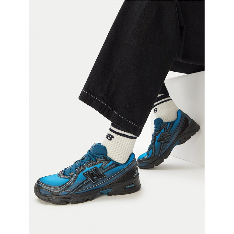 Sneakers New Balance U7402CJ Blau