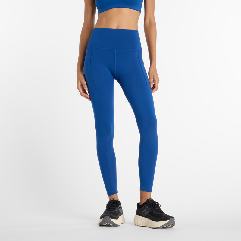 Levně Dámské modré sportovní legíny New Balance WP51268GAB