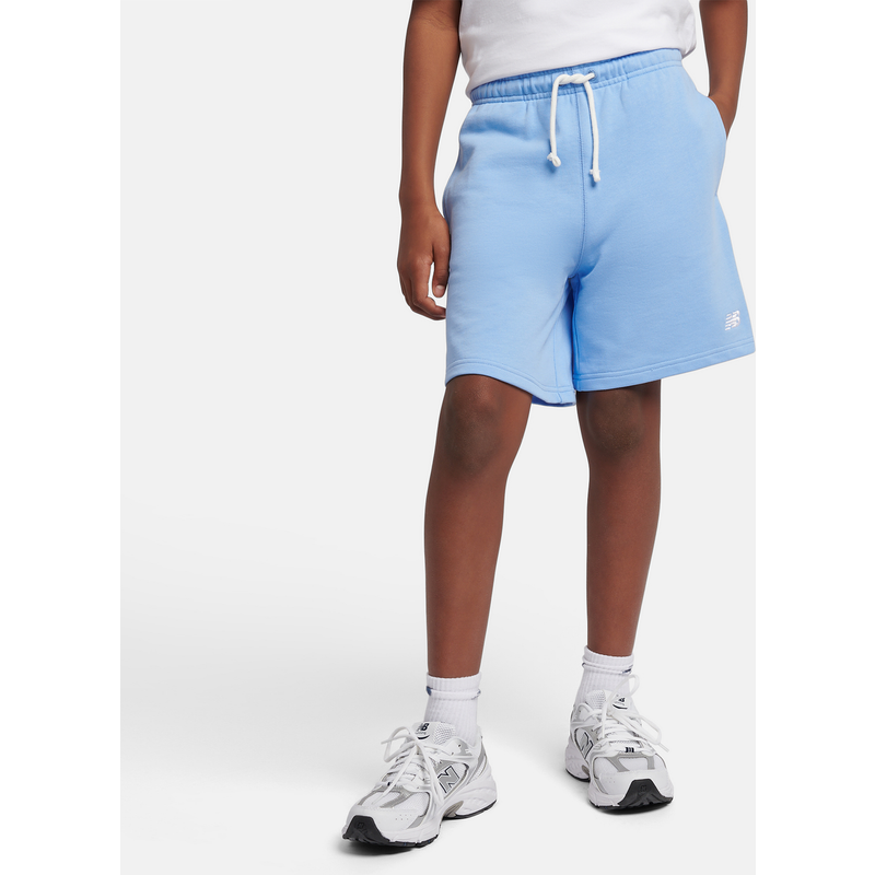 Levně Dětské šortky New Balance LAKB0008ELE – modré