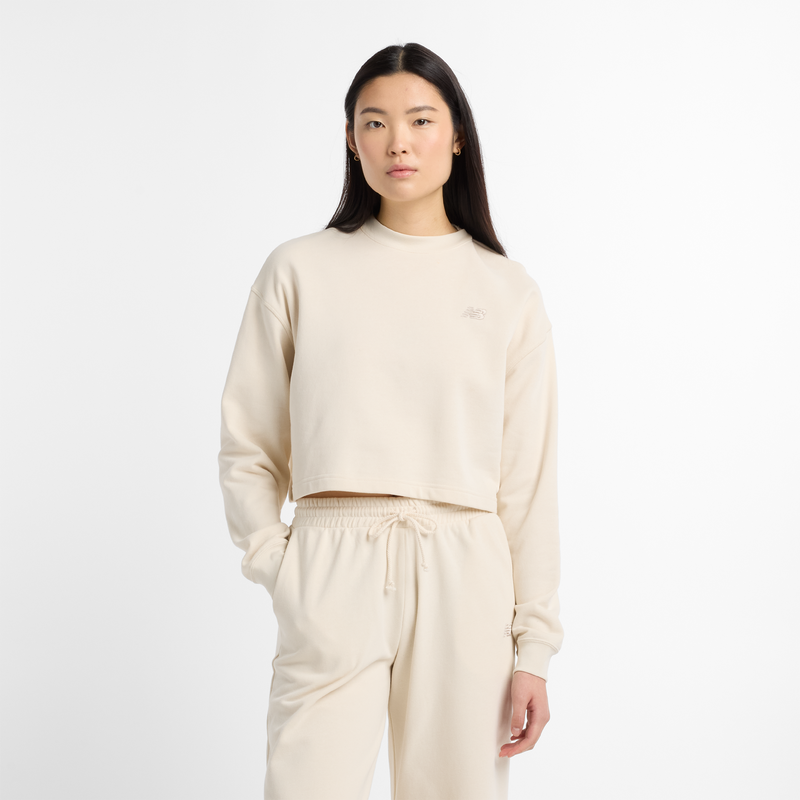 Levně Dámská mikina New Balance WT51514LIN – béžové