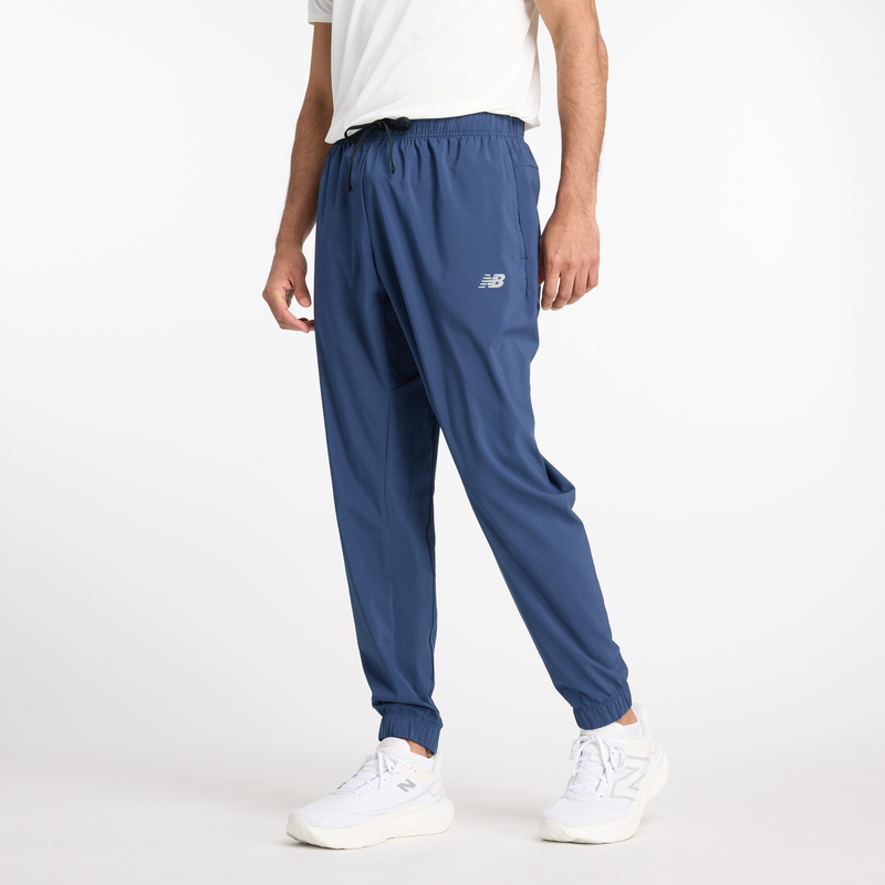 Levně Pánské kalhoty New Balance MP41011NNY – tmavomodrá