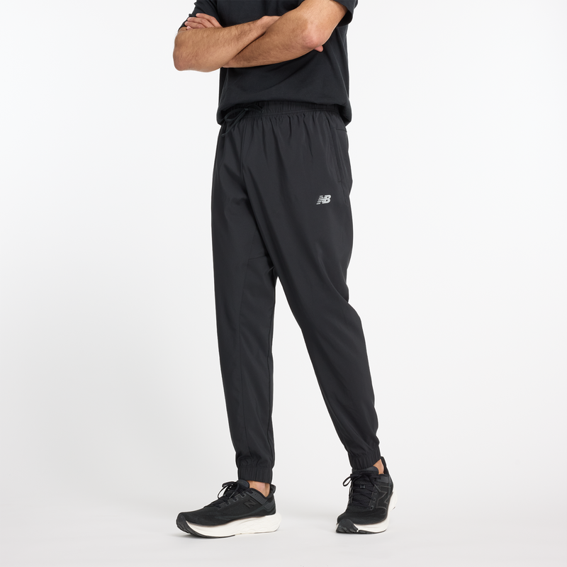 Levně Pánské kalhoty New Balance MP41011BK – černé