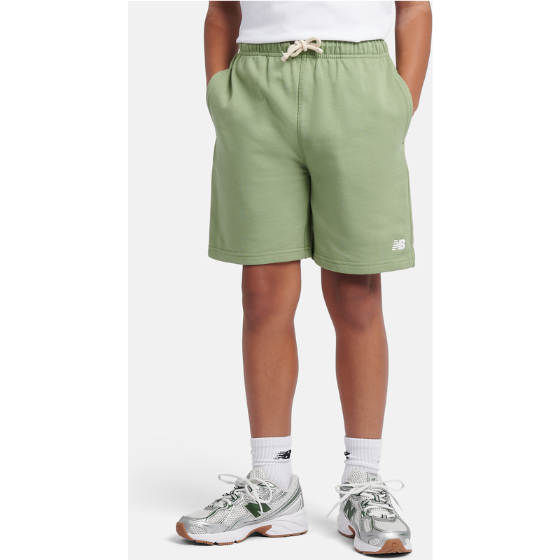 Levně Dětské šortky New Balance LAKB0008AAR – zelené