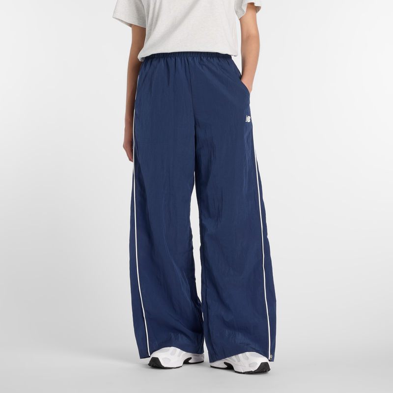 Levně Dámské kalhoty New Balance WB61Z1E6NNY – tmavomodrá