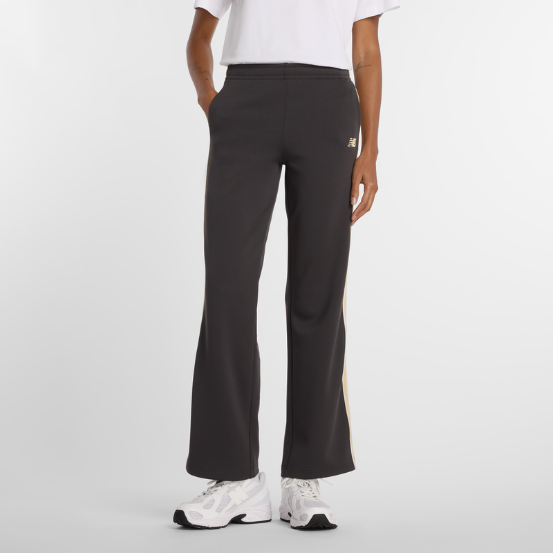 Levně Dámské kalhoty New Balance WB61Q2R4ABR – šedé