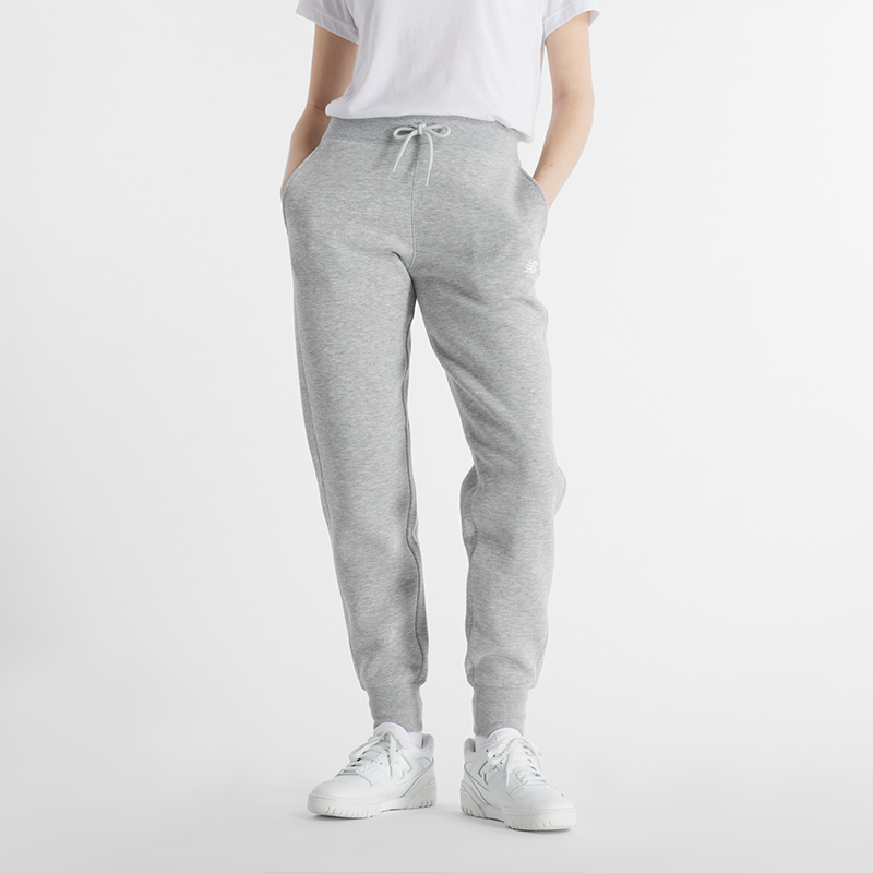 Levně Dámské kalhoty New Balance WP43805AG – šedé