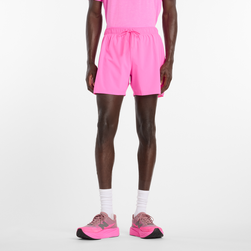 Levně Pánské šortky New Balance MS41286AAB – růžové