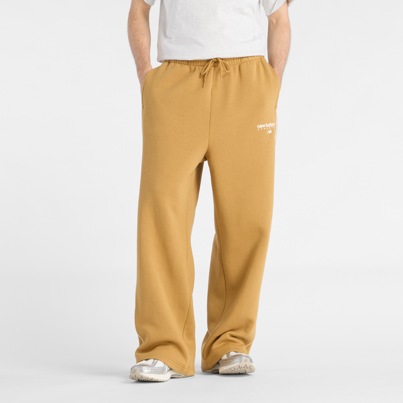 Levně Pánské kalhoty New Balance MB61M77EABG – oranžová