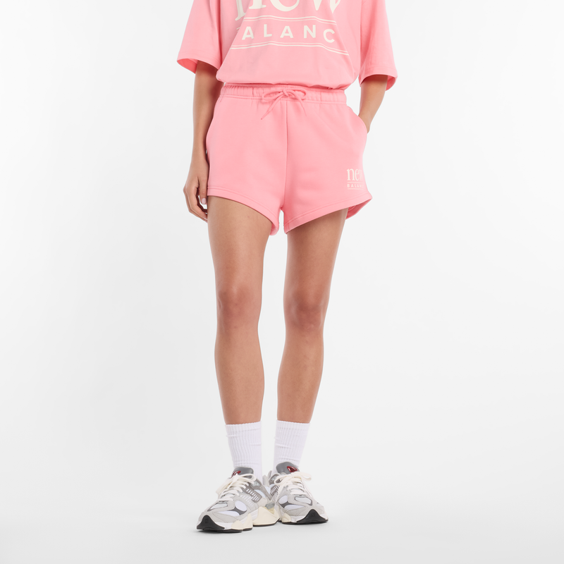 Levně Dámské šortky New Balance WB61Y80AAA6 – růžové