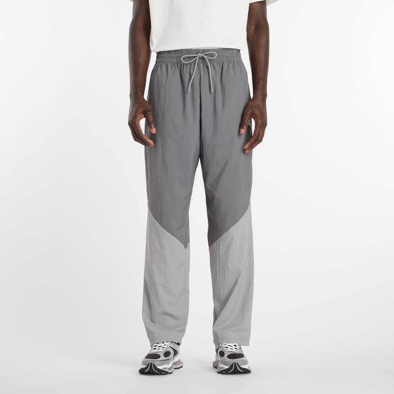 Levně Pánské kalhoty New Balance MB61R010CAS – šedé