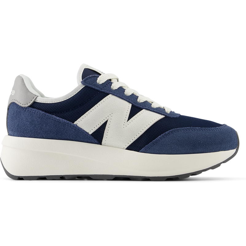 Levně Dětské boty New Balance GS370AG – tmavomodrá