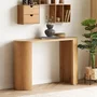 Photo of bibione console table - oval - curved panel legs - natural